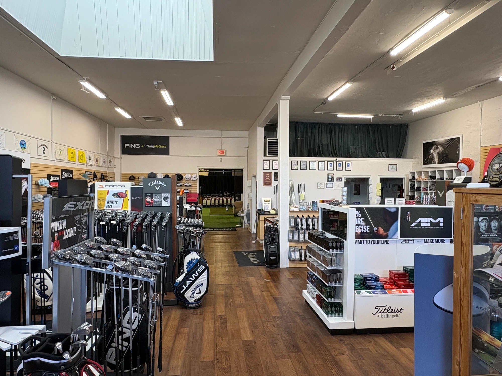 Inside Alameda Golfworks: club displays and central aisle